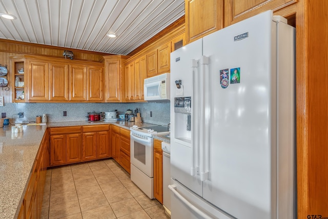 kitchen featuring wooden ceiling, tasteful backsplash, light stone counters, white appliances, and light tile patterned flooring