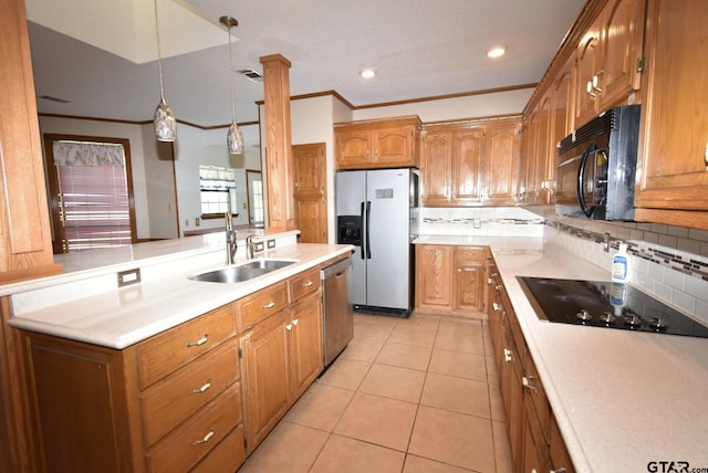 kitchen with sink, crown molding, light tile patterned floors, pendant lighting, and black appliances