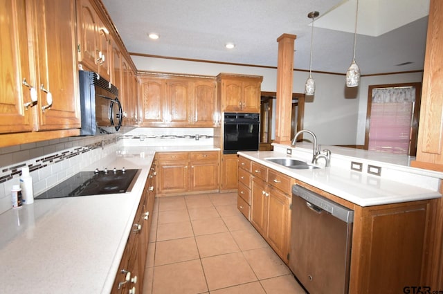 kitchen featuring decorative light fixtures, sink, ornamental molding, light tile patterned floors, and black appliances