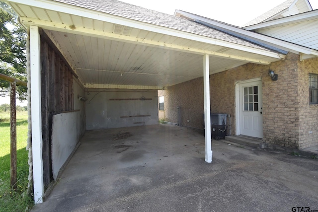 exterior space featuring a carport