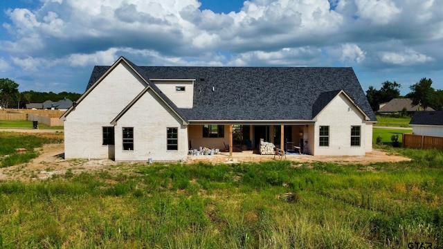 rear view of property with a patio