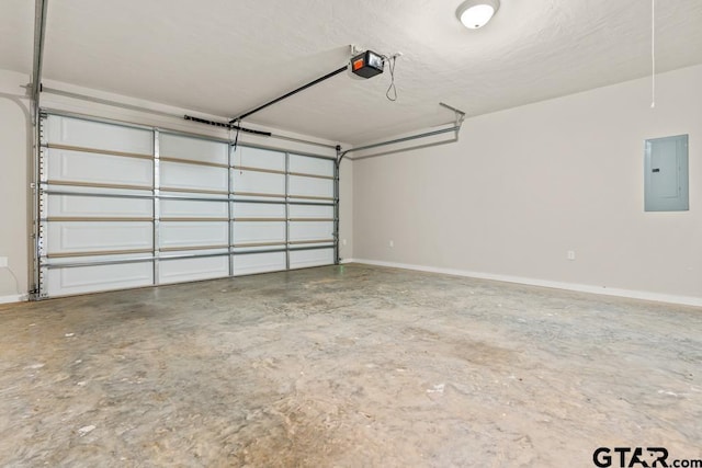 garage featuring a garage door opener and electric panel