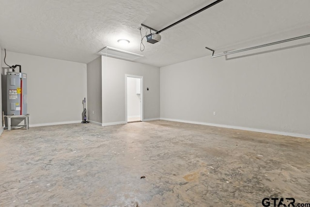 garage with a garage door opener and water heater