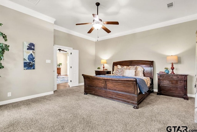carpeted bedroom with visible vents, baseboards, crown molding, and ceiling fan