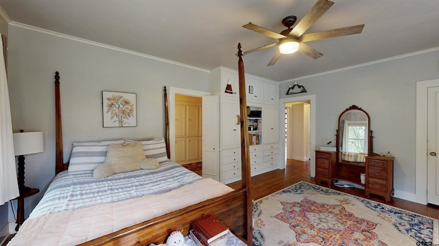 601 Troup Hwy, Tyler, TX 75701 - bedroom featuring wood finished floors, ornamental molding, and ceiling fan