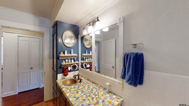 601 Troup Hwy, Tyler, TX 75701 - bathroom featuring vanity and wood finished floors