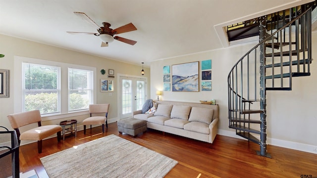 601 Troup Hwy, Tyler, TX 75701 - living room with stairway, wood finished floors, baseboards, and a ceiling fan