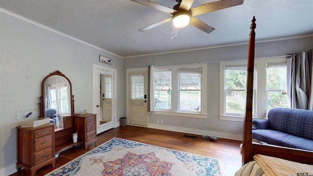 601 Troup Hwy, Tyler, TX 75701 - bedroom featuring dark wood-type flooring, ornamental molding, baseboards, and ceiling fan