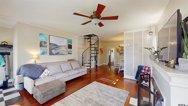 601 Troup Hwy, Tyler, TX 75701 - living room featuring stairs, ceiling fan, wood finished floors, crown molding, and a chandelier
