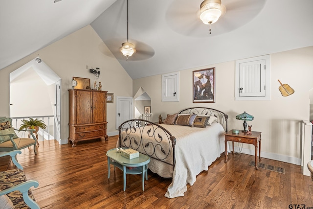 bedroom with hardwood / wood-style flooring, lofted ceiling, and ceiling fan