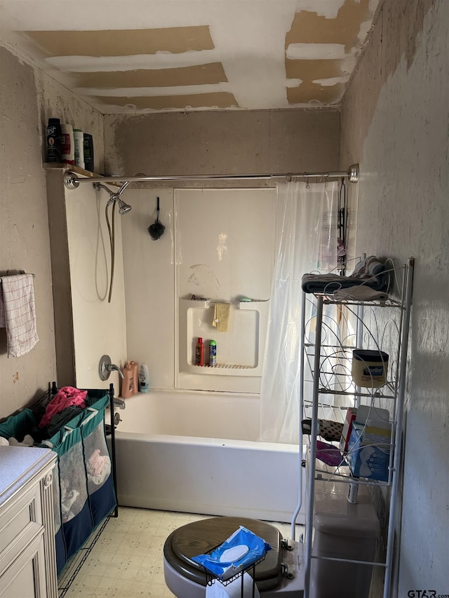 full bath featuring shower / bath combo and tile patterned floors