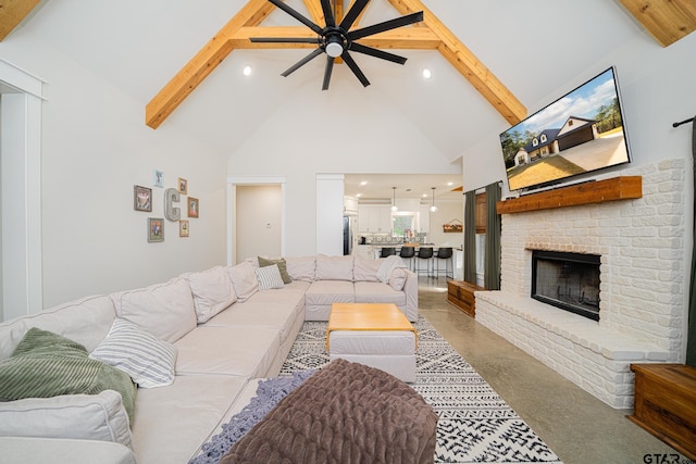 living room with beam ceiling, ceiling fan, high vaulted ceiling, and a brick fireplace