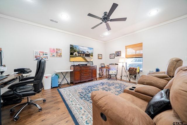 office area featuring crown molding, hardwood / wood-style floors, and ceiling fan