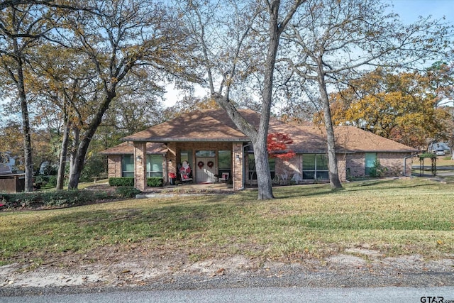 view of front of property with a front lawn