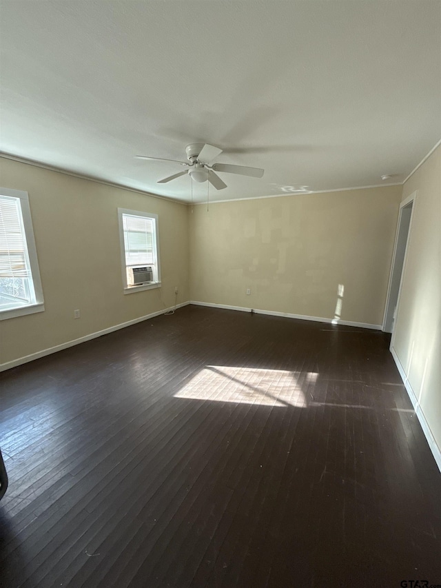 unfurnished room with ceiling fan, cooling unit, and dark hardwood / wood-style flooring