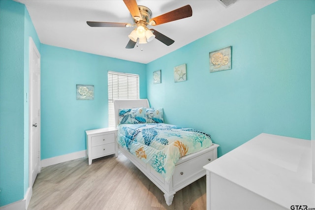 220 Pin Oak Dr, Mabank, TX 75156 - bedroom with light wood-style floors and a ceiling fan