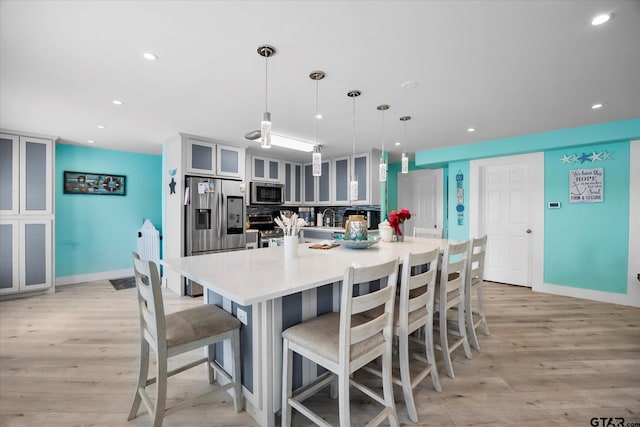 220 Pin Oak Dr, Mabank, TX 75156 - dining space with light wood-style flooring and recessed lighting