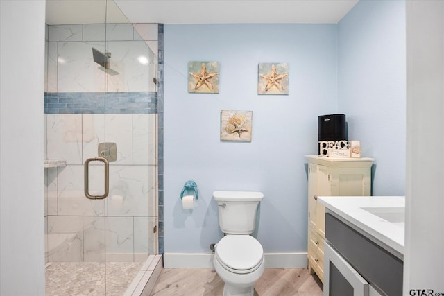 220 Pin Oak Dr, Mabank, TX 75156 - bathroom featuring vanity, a marble finish shower, and wood finished floors