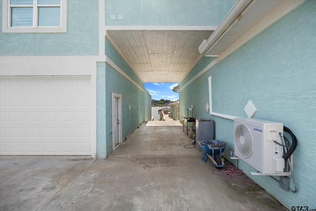 220 Pin Oak Dr, Mabank, TX 75156 - view of side of home with stucco siding and an attached garage