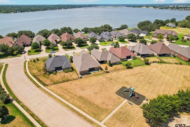 3449 Abes Landing Dr, Granbury, TX 76049 - aerial perspective of suburban area with a nearby body of water