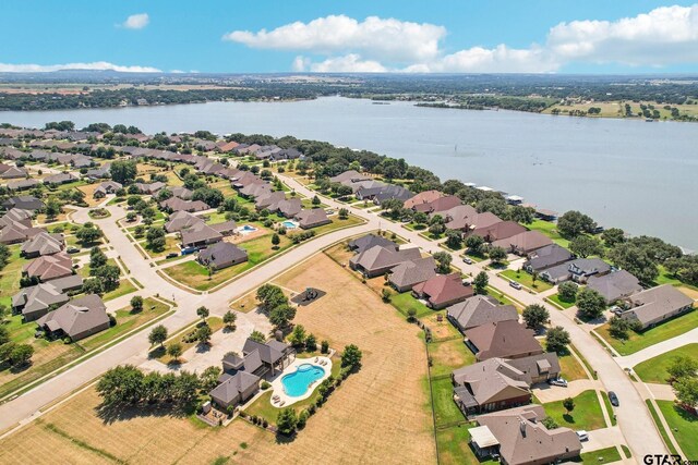 3449 Abes Landing Dr, Granbury, TX 76049 - aerial overview of property's location with a nearby body of water and nearby suburban area