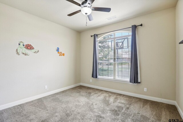3449 Abes Landing Dr, Granbury, TX 76049 - carpeted spare room featuring baseboards and ceiling fan