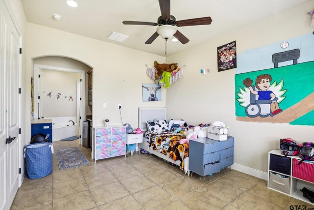 3449 Abes Landing Dr, Granbury, TX 76049 - tiled bedroom featuring arched walkways and ceiling fan