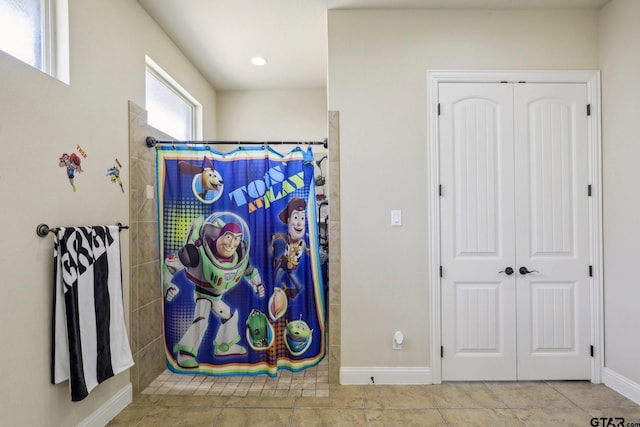 3449 Abes Landing Dr, Granbury, TX 76049 - detailed view of baseboards and recessed lighting