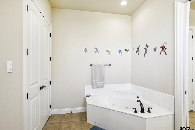 3449 Abes Landing Dr, Granbury, TX 76049 - bathroom featuring a jetted tub, tile patterned flooring, and recessed lighting