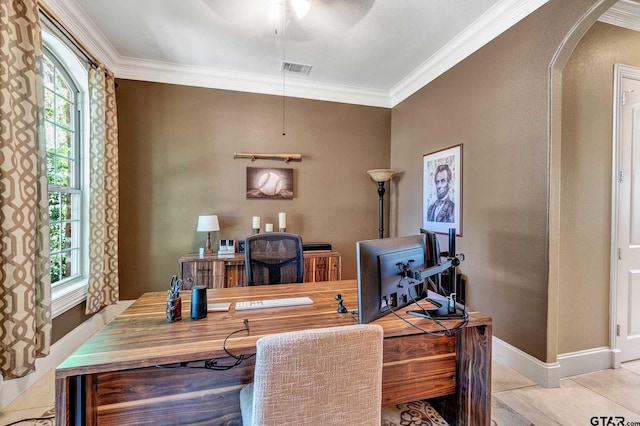 office space featuring light tile patterned floors, crown molding, and plenty of natural light