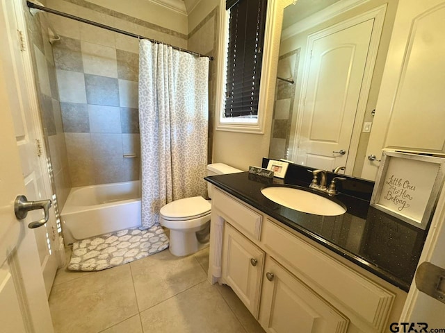 full bathroom with vanity, toilet, tile patterned flooring, and shower / tub combo