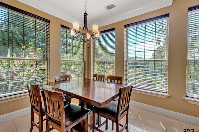 tiled dining space with ornamental molding and a notable chandelier