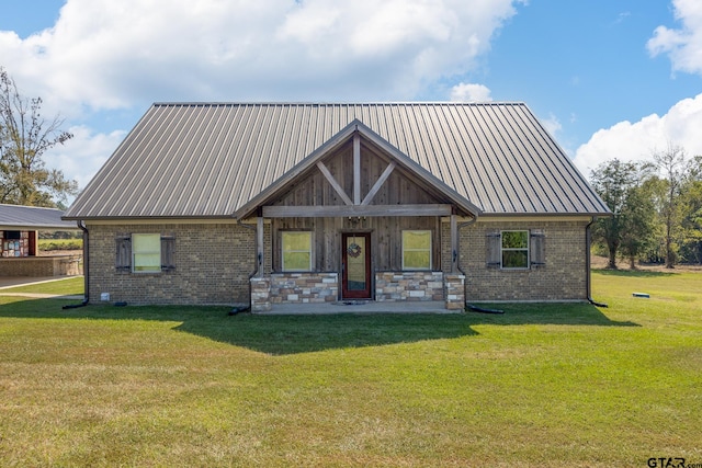 craftsman-style home with a front yard