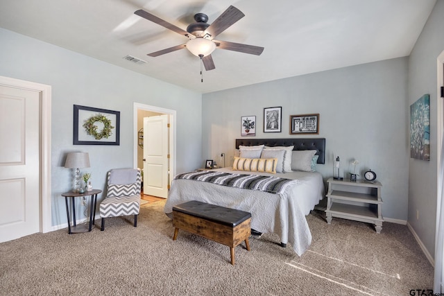 bedroom with ceiling fan and carpet flooring