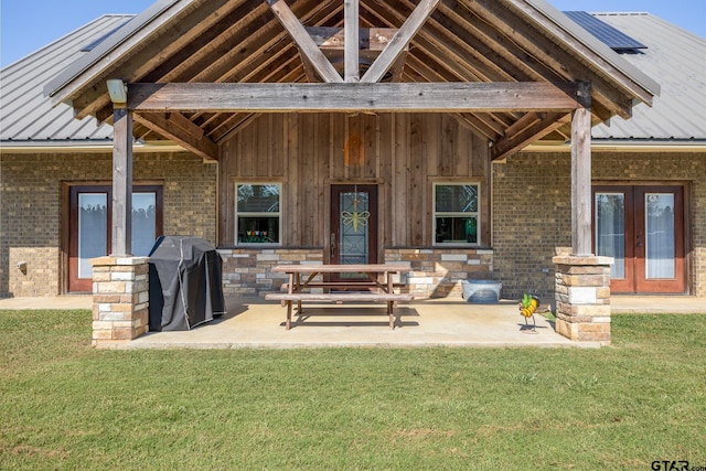 view of patio / terrace featuring french doors and area for grilling