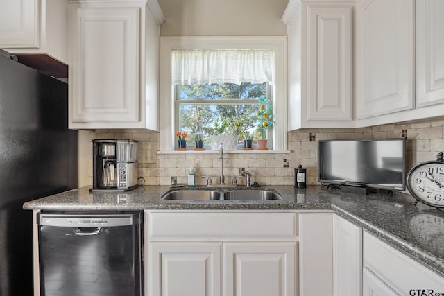 kitchen with white cabinets, sink, black appliances, and decorative backsplash