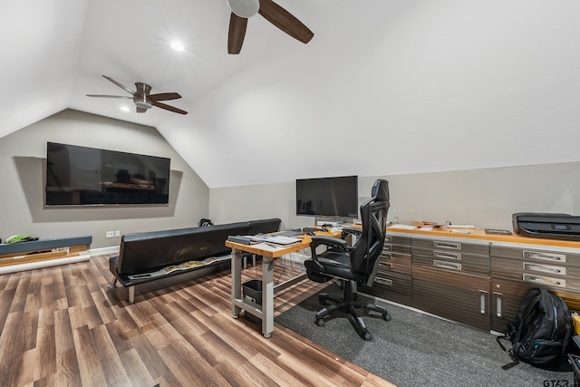 office space with vaulted ceiling, hardwood / wood-style flooring, and ceiling fan