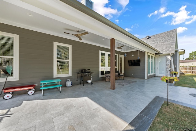 view of patio / terrace with area for grilling and ceiling fan