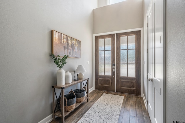 doorway featuring french doors and dark hardwood / wood-style flooring