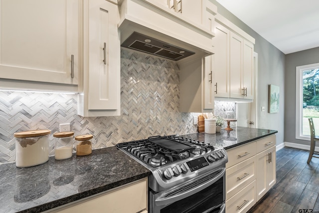 kitchen featuring white cabinets, dark hardwood / wood-style flooring, and stainless steel gas range oven