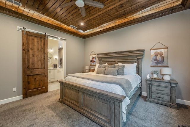 carpeted bedroom featuring wooden ceiling, ceiling fan, a raised ceiling, a barn door, and connected bathroom