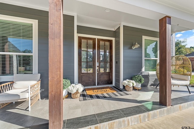 entrance to property with covered porch