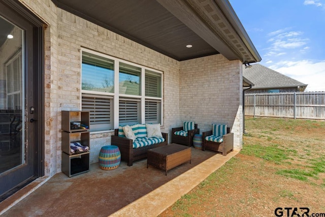 view of patio / terrace with fence