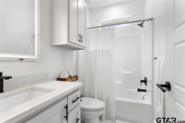 full bathroom featuring vanity, toilet, and shower / bath combo with shower curtain