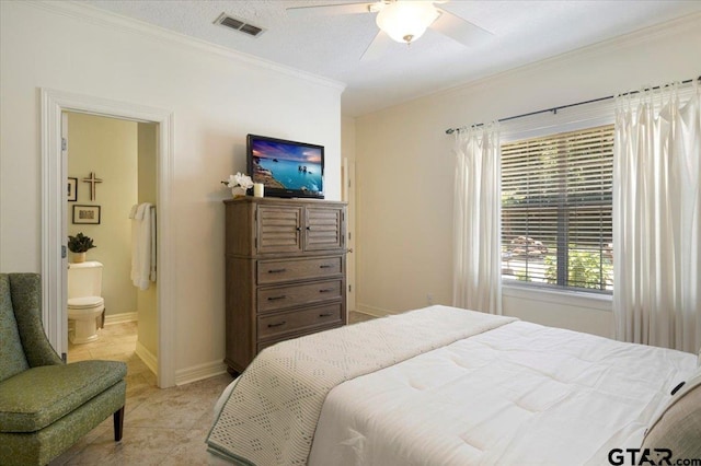 909 Univerity Dr, Carthage, TX 75633 - bedroom featuring ornamental molding, light tile patterned flooring, connected bathroom, ceiling fan, and baseboards