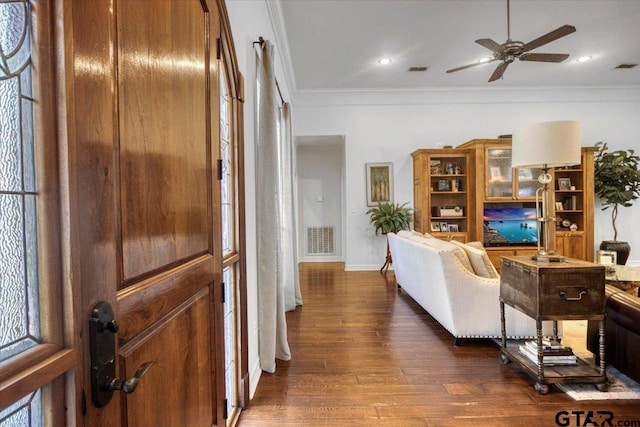 909 Univerity Dr, Carthage, TX 75633 - living room featuring crown molding, ceiling fan, dark wood finished floors, recessed lighting, and baseboards