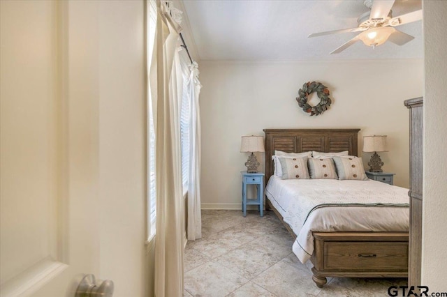 909 Univerity Dr, Carthage, TX 75633 - bedroom featuring ornamental molding and ceiling fan