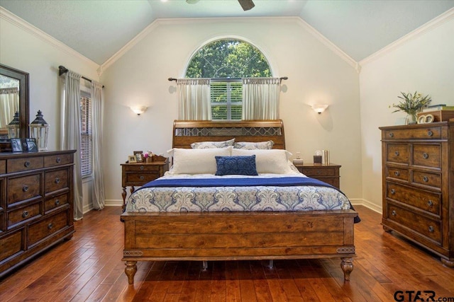 909 Univerity Dr, Carthage, TX 75633 - bedroom with dark wood-style flooring, lofted ceiling, and baseboards