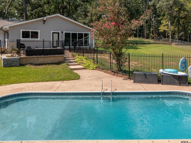 view of pool featuring central air condition unit, a lawn, and a patio area