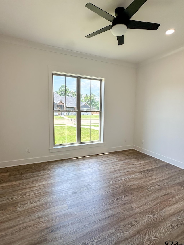 12301 Harlon, Flint, TX 75762 - unfurnished room with crown molding, a ceiling fan, dark wood-style flooring, and recessed lighting